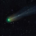 Astrophoto of periodic comet 12P Pons Brooks in the night sky. Green nucleus and tail of ion, dust and Royalty Free Stock Photo