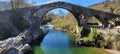 Asturia roman Bridge in sunny day Royalty Free Stock Photo