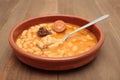 Asturian bean stew in a clay pot. Royalty Free Stock Photo