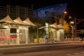 ASU net sculpture and bus stop at night in Phoenix, AZ