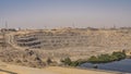 Aswan dam on the Nile. A highway, power lines and towers, technological buildings are visible Royalty Free Stock Photo