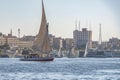 12.11.2018 Aswan, Egypt, A boat felucca sailing along a river of nilies on a sunny day Royalty Free Stock Photo