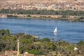 12.11.2018 Aswan, Egypt, A boat felucca sailing along a river of nilies on a sunny day