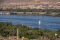 12.11.2018 Aswan, Egypt, A boat felucca sailing along a river of nilies on a sunny day