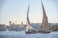 12.11.2018 Aswan, Egypt, A boat felucca sailing along a river of nilies on a sunny day