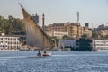 12.11.2018 Aswan, Egypt, A boat felucca sailing along a river of nilies on a sunny day