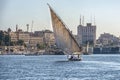 12.11.2018 Aswan, Egypt, A boat felucca sailing along a river of nilies on a sunny day