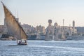 12.11.2018 Aswan, Egypt, A boat felucca sailing along a river of nilies on a sunny day
