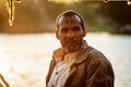 Aswan, Egypt - Dec. 2018: Portrait of an Egyptian fisherman at sunset. People of Egypt