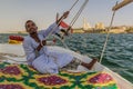ASWAN, EGYPT: FEB 15, 2019: Crewman of a felucca sail boat at the river Nile near Aswan, Egy