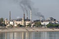 Polluting factory on the shore of Nile river. Cruising on Nile River. Egypt Royalty Free Stock Photo