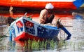 Man wearing a turban on a boat on nile river