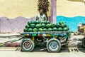 ASWAN EGYPT 20.05.18 Men watermelon fruit seller with rolling store on the street in the city Royalty Free Stock Photo