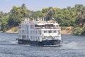 Aswan, Egypt - September 13, 2018: A Tourist boat motor down the River Nile towards Aswan in central Egypt. The tourist boats Royalty Free Stock Photo