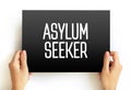 Asylum Seeker text quote on card, social concept background