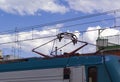 Pantograph connecting the train to the overhead catenary wire Royalty Free Stock Photo