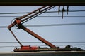 the asymmetrical pantograph connecting the train to the overhead catenary wire Royalty Free Stock Photo