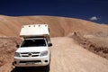 ATACAMA DESERT, CHILE - DECEMBER 19. 2011: 4 wheel camperlost in endless barren landscape