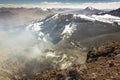 Atacama desert, snowcapped Lascar volcano crater and arid landscape in Chile Royalty Free Stock Photo