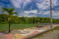 ATACAMES, ECUADOR - March 16, 2016: Unidentified man enjoying the view near of a river in Atacames, Ecuador