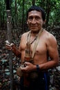 Tribal elder Binan Tukum hunting with his son for monkeys in the rainforest