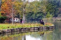 Ataturk Arboretum. Autumn trees around lake.