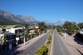 Ataturk Boulevard in Kemer and Taurus mountains at far on a bright sunny day