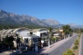 Ataturk Boulevard in Kemer and Taurus mountains at far on sunny day