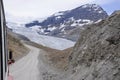 Ice Explorer Snow coaches on the Athabasca Glacier. Royalty Free Stock Photo