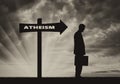 Atheist men stands near road sign Atheism