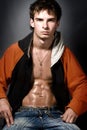 Atheltic young man with muscular abs Royalty Free Stock Photo