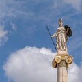 Athena marble statue the ancient greek goddess of knowledge and wisdom under blue sky with clouds