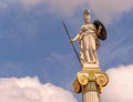 Athena marble statue on Ionic column and partly cloudy sky, space for text.