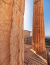 Athena Nike ancient Greek temple between doric columns, Acropolis. Royalty Free Stock Photo