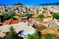 Athens city view from the area of Anafiotika in Plaka district with Lycabetus hill in the background