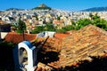 Athens city view from the area of Anafiotika in Plaka district with Lycabetus hill in the background Royalty Free Stock Photo
