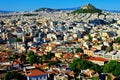Athens city view from the area of Anafiotika in Plaka district with Lycabetus hill in the background
