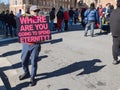 Street evangelist holds sign asking where people will spend eternity