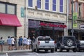 A group of young adults wait in line to enter a restaurant in downtown Athens, Georgia Royalty Free Stock Photo