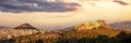 Athens, Greece. Acropolis of Athens and Mount Lycabettus panorama from Areopagus hill at sunset Royalty Free Stock Photo