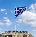 ATHENS, GREECE Ã¢â¬â 1 APRIL 2019: Huge Greece flag on the top of Actopolis Hill Royalty Free Stock Photo