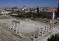 Hadrian library site ruins in Athens through modern houses