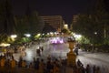 Syntagma square at night with its colored fountain
