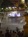 Syntagma square at night with its colored fountain