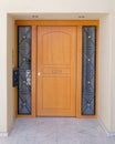 Athens Greece, contemporary apartment building main entrance wooden door Royalty Free Stock Photo