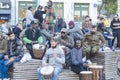 Athens, Greece / Dec 16.2018 Young Africans, Europeans guys playing drums in the city. Street musicians, with dreadlocks, dressed