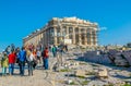 ATHENS, GREECE, DECEMBER 10, 2015: Many tourists visiting ancient temple Parthenon on Acropolis, Athens, Greece...IMAGE Royalty Free Stock Photo