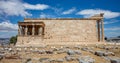 Athens, Greece. Erechtheion with Caryatid Porch on Acropolis hill, blue sky background