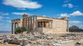 Athens, Greece. Erechtheion with Caryatid Porch on Acropolis hill, blue sky background