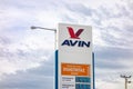 Banner of the Avin petroleum company and its petrol station with prices